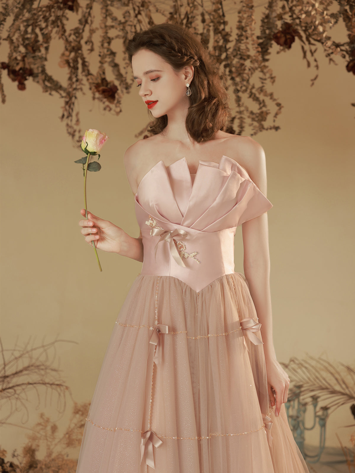 Elegant Blush Pink Strapless Tulle Ball Gown with Bow Accents - Harmony Gallery