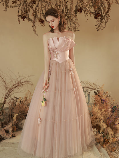 Elegant Blush Pink Strapless Tulle Ball Gown with Bow Accents - Harmony Gallery