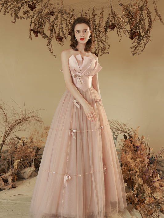 Elegant Blush Pink Strapless Tulle Ball Gown with Bow Accents - Harmony Gallery