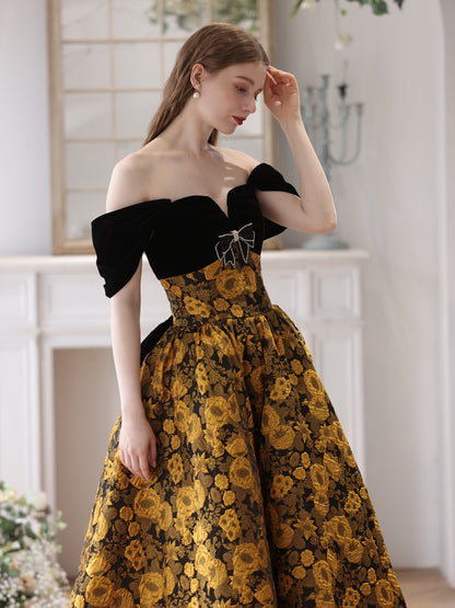 Elegant Black and Gold Floral Strapless Ball Gown with Bow Accent - Harmony Gallery