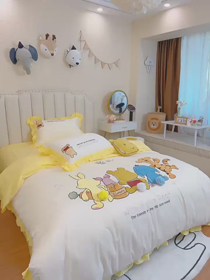 Simpatico set letto in quattro pezzi di Winnie the Pooh in puro cotone
