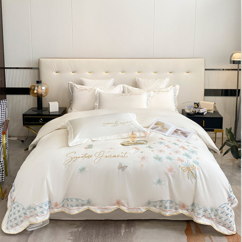 Summer Washed Ice Silk Embroidery Four-Piece Bed Set - Harmony Gallery